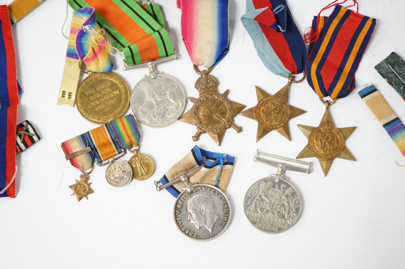 A collection of military medals, shoulder titles, whistles, etc. including; a WWI medal trio to 19698 PTE. T. Campbell. 10-CAN. INF., a miniature trio, four WWII medals; the Burma Star, the 1939-1945 Star, the Defence Me
